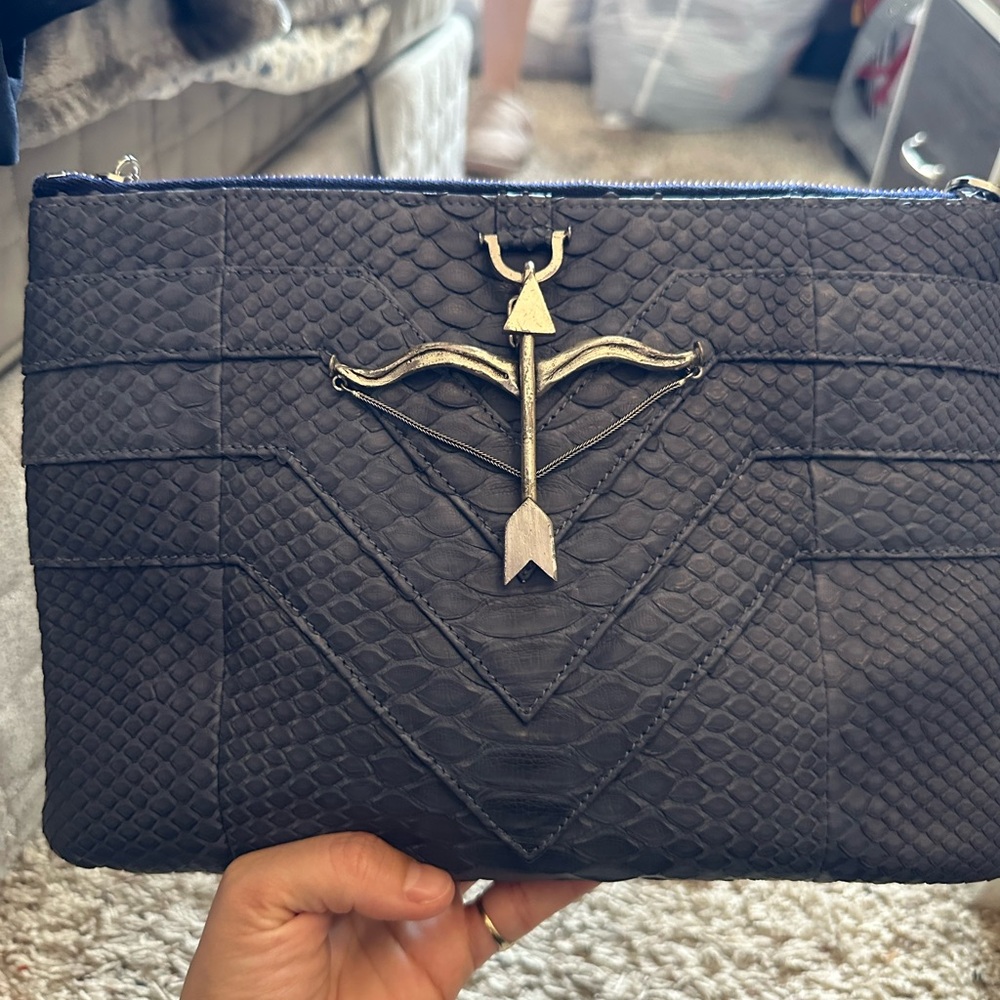 Black Designer Clutch with Arrow Emblem
